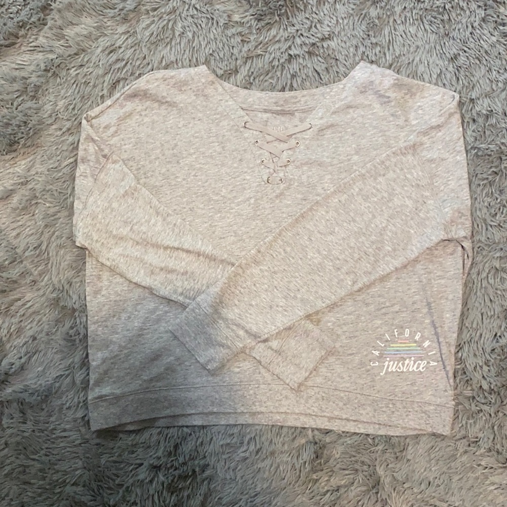 Long sleeve Grey Justice shirt size 14/16 girls.